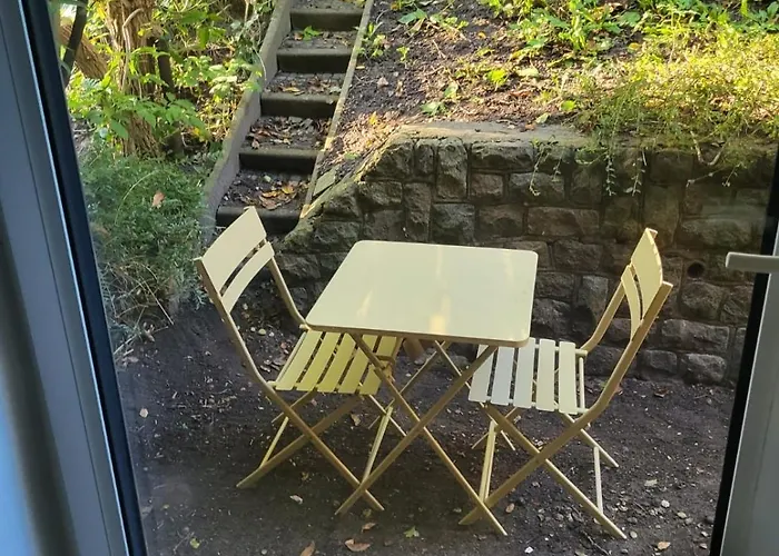 Апартаменты Komfortable Stadtwohnung Mit Terrasse